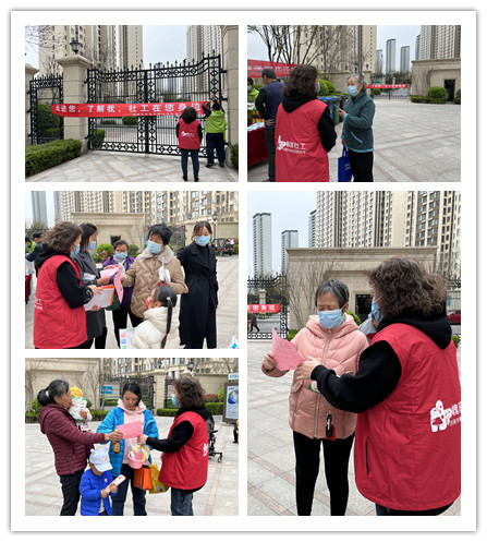 社工与志愿者悬挂横幅、分发宣传单页.jpg